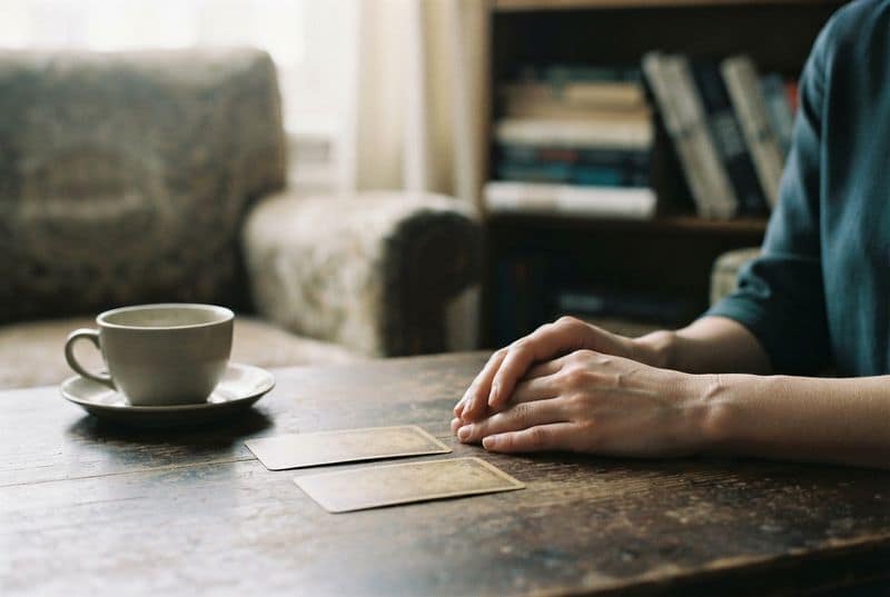 A two-card reading before a conversation you are dreading